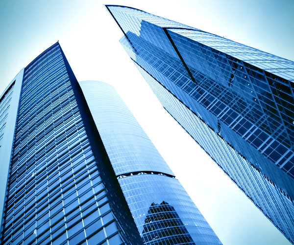 Glass silhouettes of skyscrapers at night