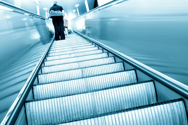 Blue moving escalator — Stock Photo, Image