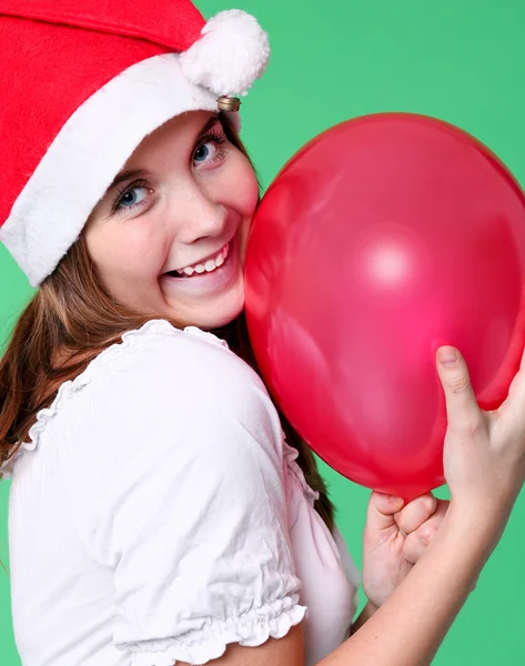 Cute young girl with christmas balls — Stock Photo, Image