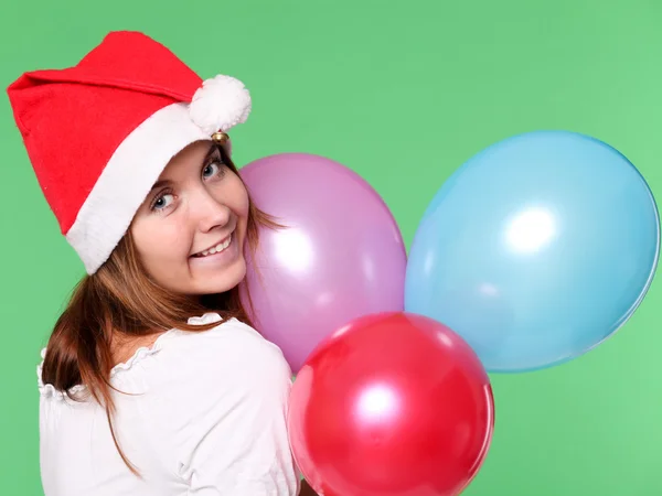Noel topları ile sevimli genç kız — Stok fotoğraf
