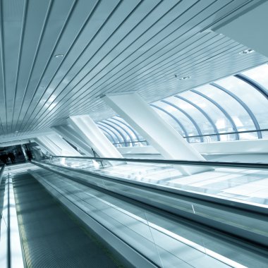 Perspective view to moving escalator in metro station clipart