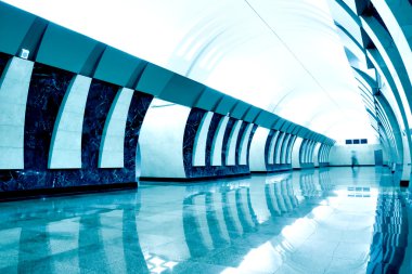 Perspective view to moving staircase in metro station clipart