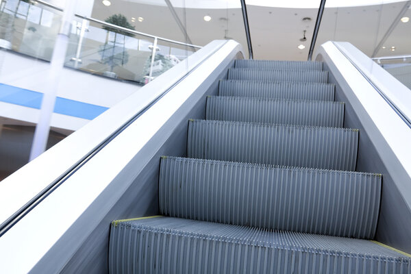 Moving escalator in airport