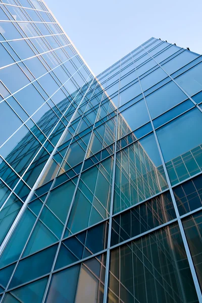 Modern glass silhouettes of skyscrapers at night — Stock Photo, Image