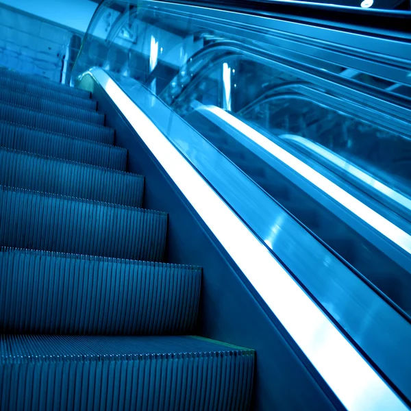 Perspective view to moving staircase in metro station — Stock Photo, Image