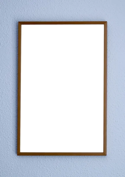 Moldura vazia na parede branca na exposição — Fotografia de Stock