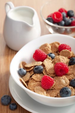 Cornflakes with fresh berries clipart