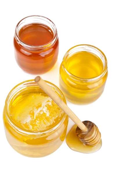 Honung i burkar isolerade — Stockfoto