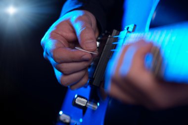 Closeup of guitarist hands clipart