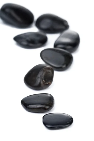 Stock image Black spa stones isolated