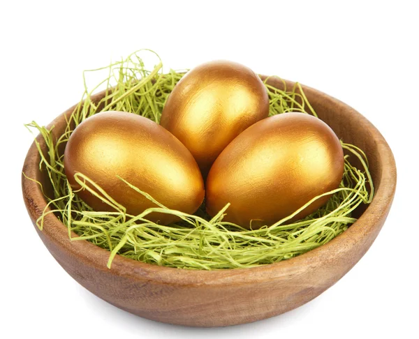 Golden easter eggs in bowl isolated — Stock Photo, Image