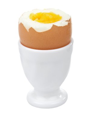 Boiled egg in egg cup isolated clipart