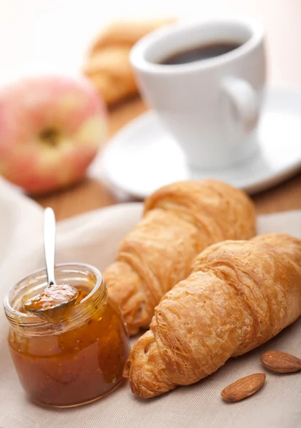 Croissant with jam for breakfast — Stock Photo, Image