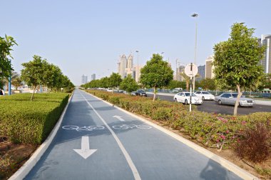 Grey bicycle path in Abu dabi clipart