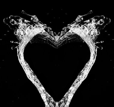 Stylish water splash. Isolated on black background clipart