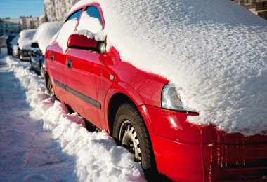 Snow covered cars clipart