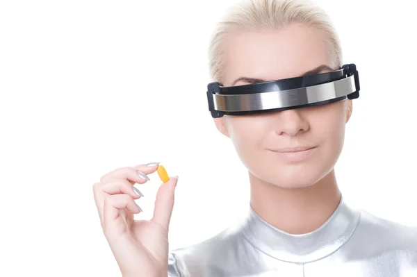 Beautiful cyber woman with a pill — Stock Photo, Image
