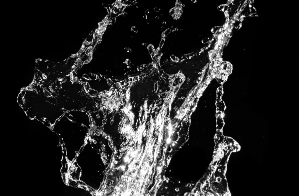 Salpicadura de agua con estilo. Aislado sobre fondo negro —  Fotos de Stock