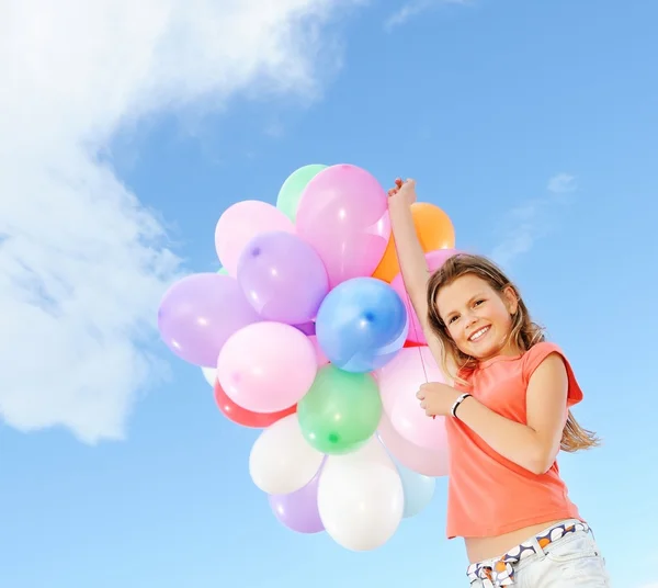 Szczęśliwa dziewczyna z balonami — Zdjęcie stockowe