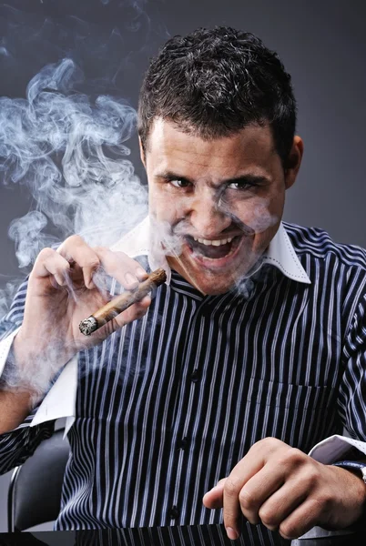 Portrait of a man smoking cigar — Stock Photo, Image