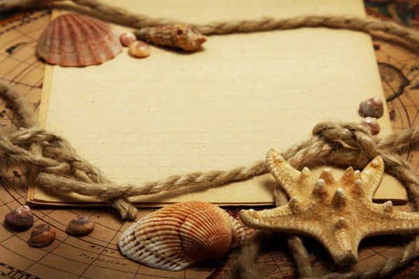 stock image Empty exercise book, seashells and rope