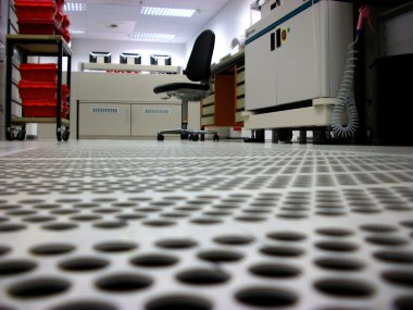 Ventilated floor with apertures in a clean room clipart