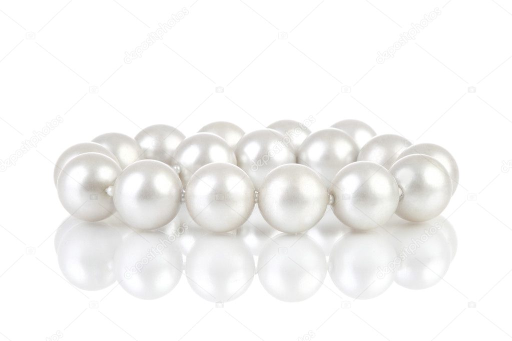 Pearls breads with reflection on white background