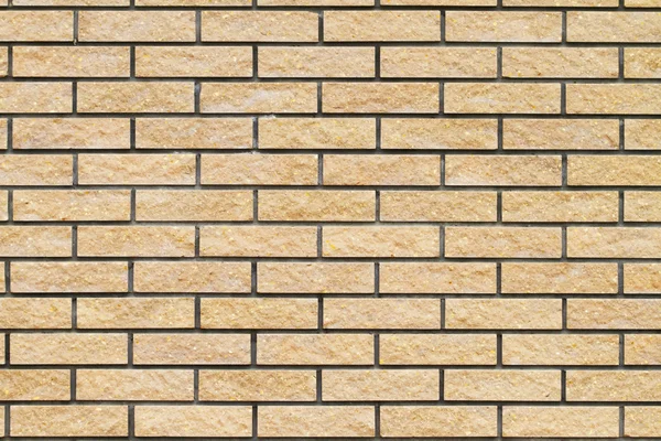 Fundo de uma parede de tijolo — Fotografia de Stock