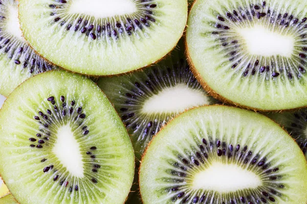 stock image Background from the kiwis cut by rings