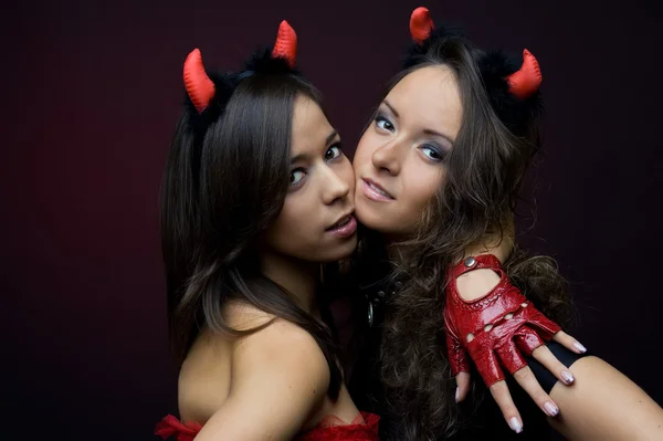 Two attractive devils — Stock Photo, Image