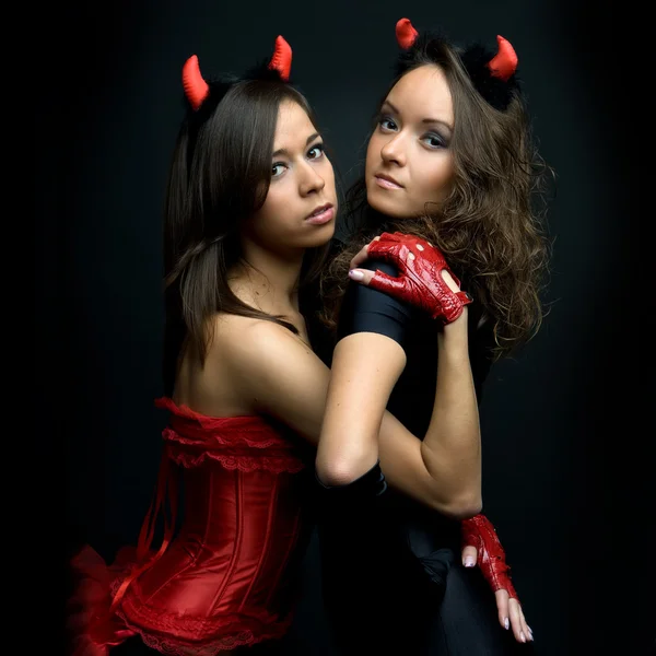 Dvě atraktivní devils — Stock fotografie