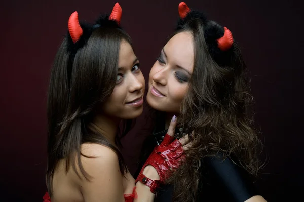 Two attractive devils — Stock Photo, Image