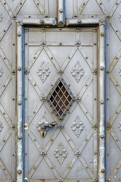 stock image Old metal door in old town