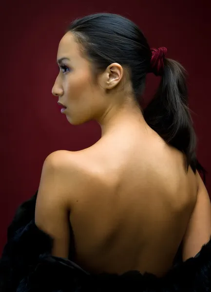 Beautiful woman with naked back — Stock Photo, Image