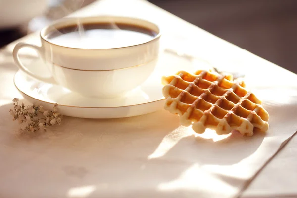 Hot coffee with wafers