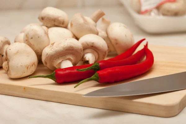 stock image Red hot chili pepper and mushrooms