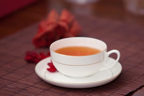 stock image Black tea in a white cup