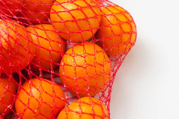 stock image Mandarin . Kg a tangerine in a grid