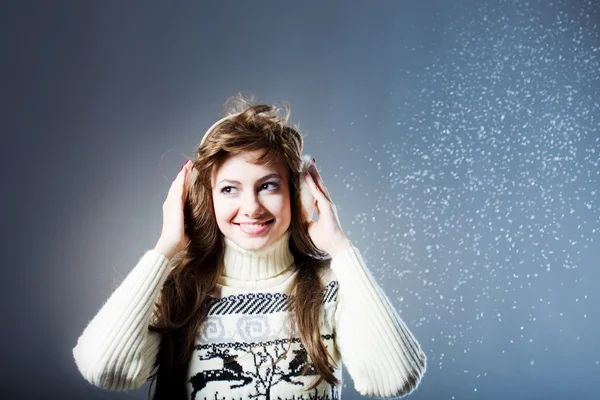 Young beautiful girl rejoices to snow — Stock Photo, Image