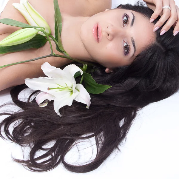 stock image Beautiful woman with lily