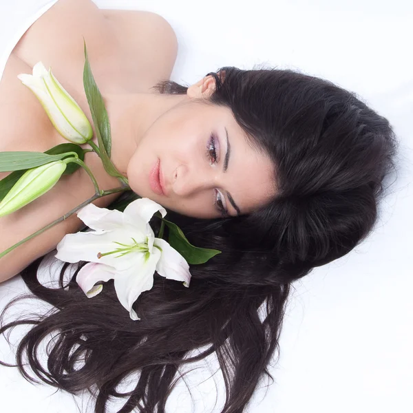 Beautiful woman with lily — Stock Photo, Image