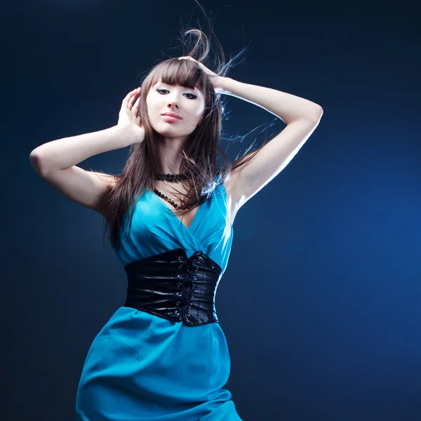 Beautiful girl in a blue dress Stock Image