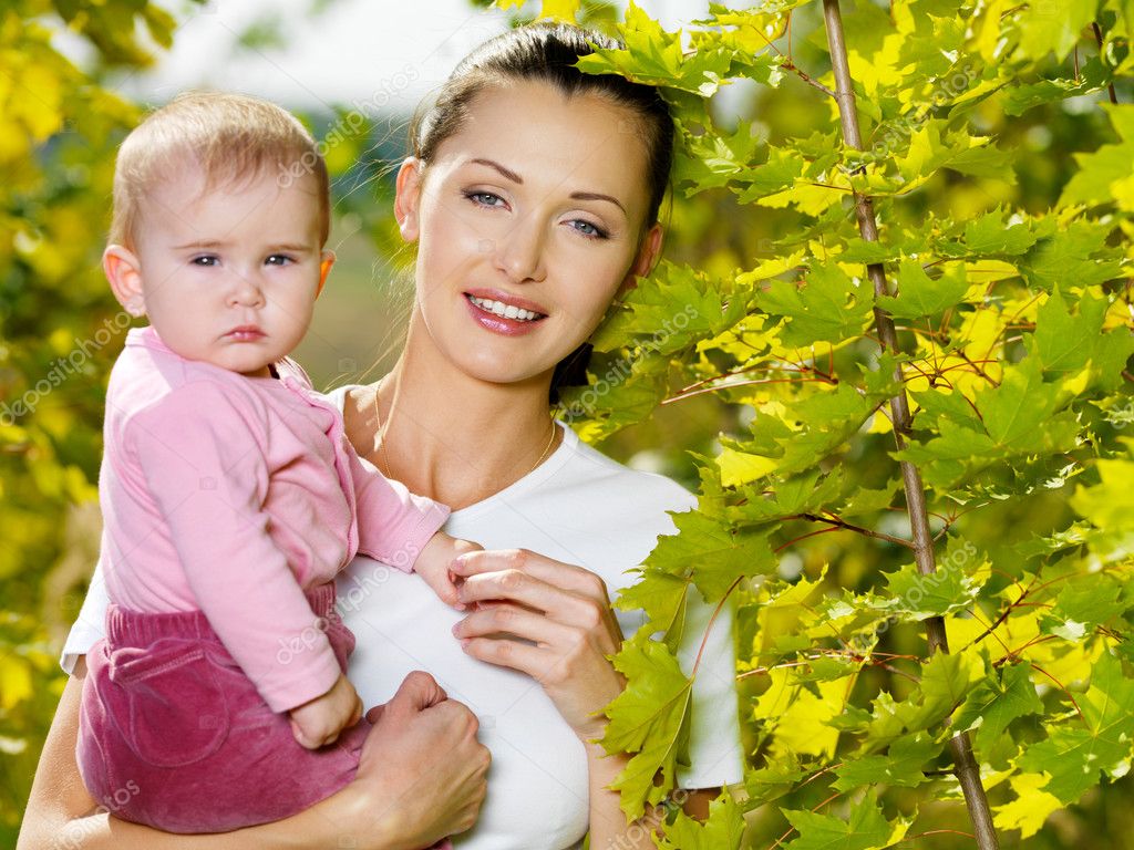 Happy smiling mather with baby outdoor Stock Photo © valuavitaly #4094988