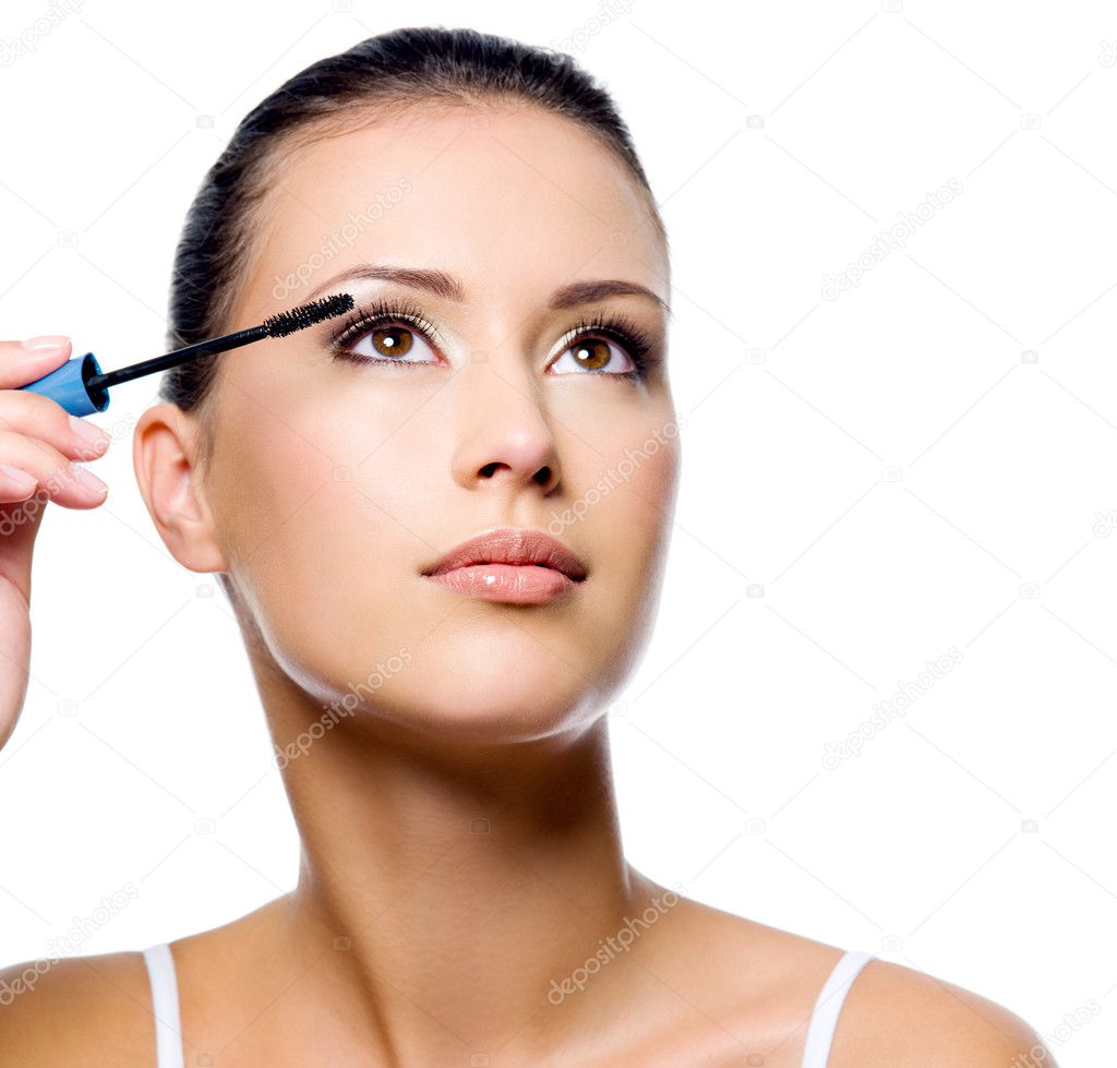 Woman applying mascara on eyelashes — Stock Photo © valuavitaly 4485532