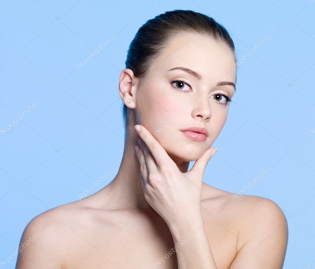 Young woman with clean healthy skin on face — Stock Photo © valuavitaly ...