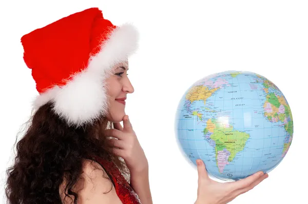 Weihnachtsmädchen mit Globus — Stockfoto