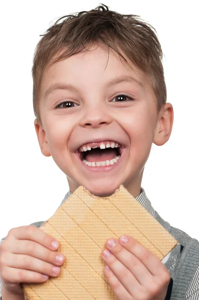 Boy with a waffle — Stock Photo, Image
