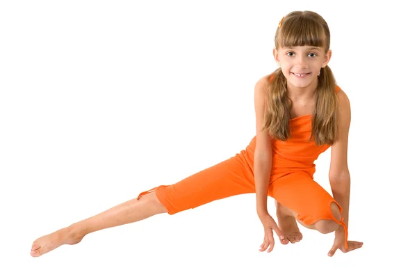 Het meisje in oranje kleding — Stockfoto