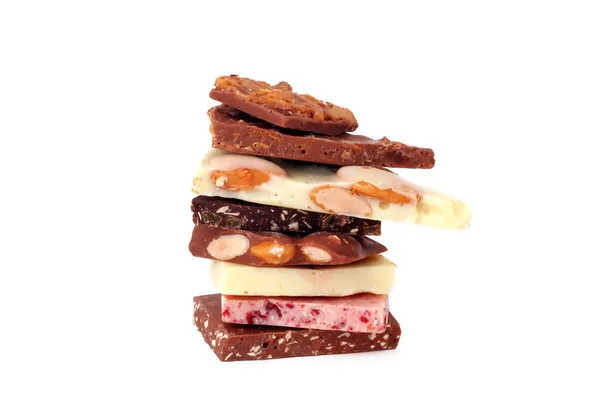 Stos kawałków czekolady różnych — Zdjęcie stockowe