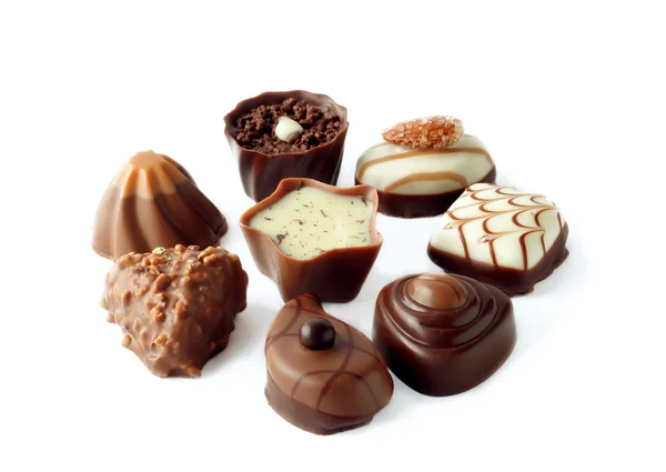 Coleção de belos doces de chocolate deliciosos — Fotografia de Stock